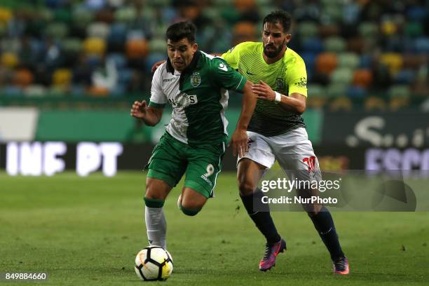 Sportings forward Acuna from Argentine and Maritimo's defender Cristiano Gomes from Portugal during the Portuguese Cup 2017/18 match between Sporting...