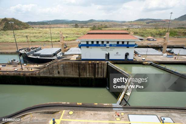 Gatun Lock in the Panama Canal December 1999 before United States returned sovereignty to Panama. The Panama Canal locks is a lock system that lifts...