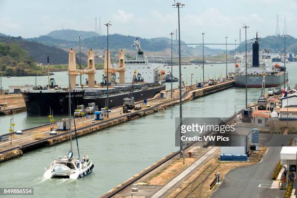 Gatun Lock in the Panama Canal December 1999 before United States returned sovereignty to Panama. The Panama Canal locks is a lock system that lifts...