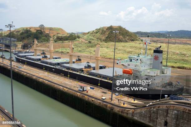 Gatun Lock in the Panama Canal December 1999 before United States returned sovereignty to Panama. The Panama Canal locks is a lock system that lifts...