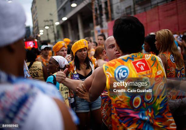 February 22 : A carnival reveller punches another during Ivete Sangalo's presentation in Salvaor's streets, on February 22 Salvador, Brazil.