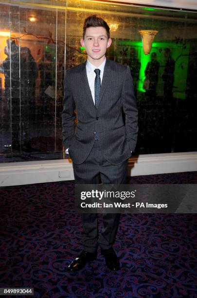 Tom Holland arriving at the Empire Film Awards at the Grosvenor House Hotel in London.