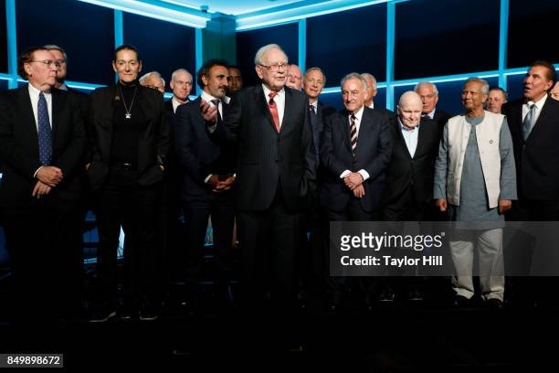 Warren Buffett speaks in honor of the Forbes Media Centennial Celebration at Pier 60 on September 19, 2017 in New York City. Among the people behind...