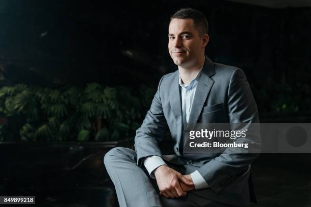 Roger Ver, chief executive officer of Bitcoin.com., poses for a photograph at the Shape the Future: Blockchain Global Summit in Hong Kong, China, on...