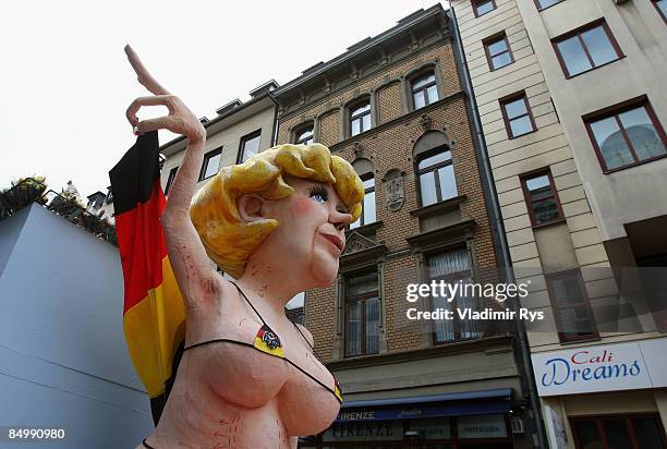 Model of a German Chancelor Angela Merkel is pictured during the 'Rose Monday' traditional carnival in Rhine area on February 23, 2009 in Cologne,...