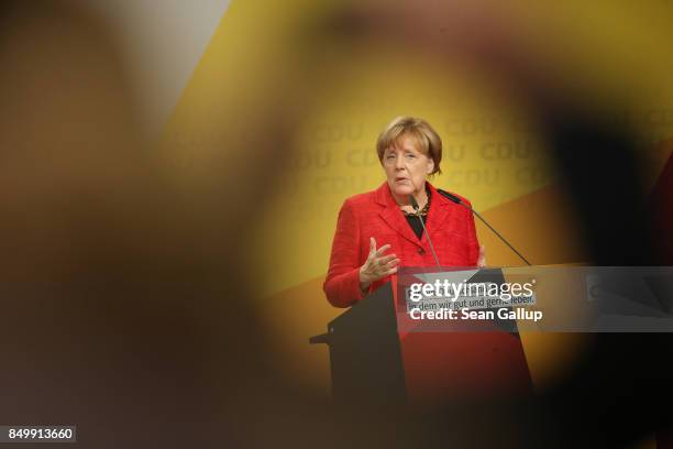 German Chancellor and Christian Democrat Angela Merkel speaks at an election campaign stop on September 19, 2017 in Schwerin, Germany. Merkel is...