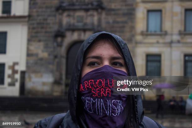 Woman during a demonstration on the International Women's Day, to draw attention to violence against women, in Bogot, Colombia.