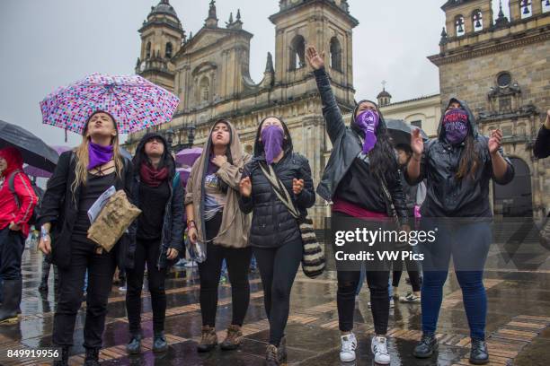 Women during a demonstration on the International Women's Day, to draw attention to violence against women, in Bogot, Colombia on March 08, 2017.