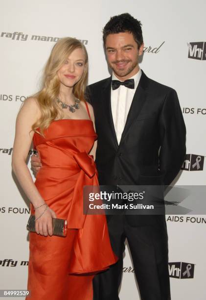 Actors Amanda Seyfried and Dominic Cooper arrive at the 17th Annual Elton John AIDS Foundation's Academy Award Viewing Party held at the Pacific...