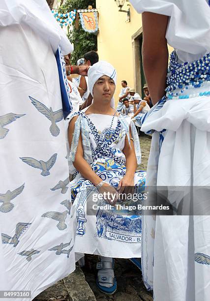 Member of the group Filhos de Gandhy rests in the historic center of Salvador, Pelourinho, on February 22, 2009 in Salvador, Brazil. Filhos de Gandhy...