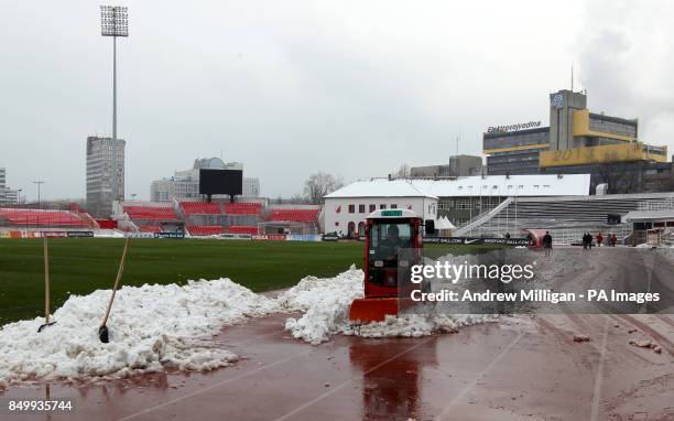 General view of snow being cleared inside the stadium before the FIFA World Cup Qualifying, Group A match at Karaorde Stadium, Novi Sad, Serbia.