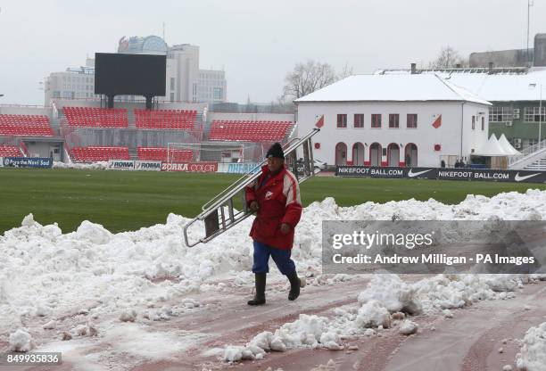 General view of stadium being cleared of snow before the FIFA World Cup Qualifying, Group A match at the Karaorde Stadium, Novi Sad, Serbia.