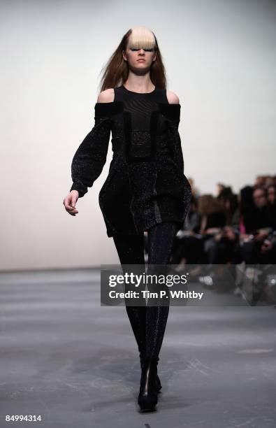 Model walks down the catwalk during the Louise Goldin show, as part of London Fashion Week a/w 2009 at the Topshop Venue, University of Westminster...