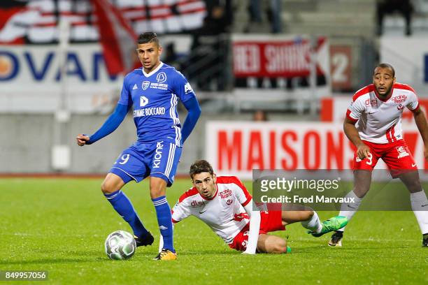 Yanis Merdji of Bourg en Bresse and Vincent Marchetti of Nancy and Tobias Badila of Nancy during the French Ligue 2 mach between Nancy and Bourg en...