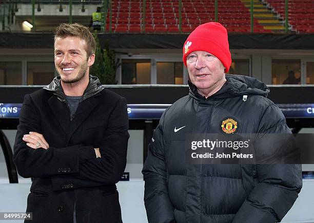 David Beckham of AC MIlan speaks with Sir Alex Ferguson of Manchester United during a training session ahead of their UEFA Champions League...