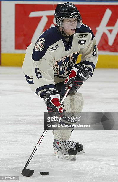 Ryan Ellis of the Windsor Spitfires skates with the puck in a game against the London Knights on February 20, 2009 at the John Labatt Centre in...