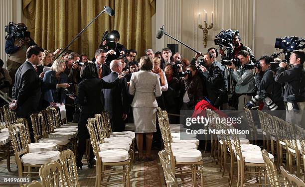 House Speaker Nancy Pelosi speaks to reporters in the East Room after President Barack Obama spoke about his upcoming budget at the White House on...