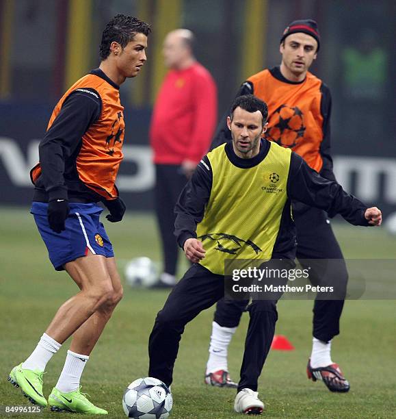 Cristiano Ronaldo and Ryan Giggs of Manchester United in action during a training session ahead of their UEFA Champions League Quarter-Final First...