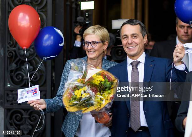 Newly elected Federal Councillor, Liberal-Radical party member Ignazio Cassis and his wife Paola react after an election meeting of the Federal...