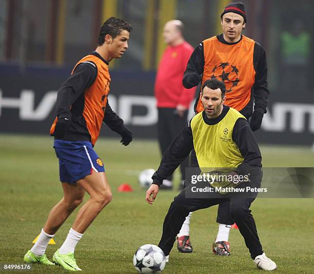 Cristiano Ronaldo and Ryan Giggs of Manchester United in action during a training session ahead of their UEFA Champions League Quarter-Final First...