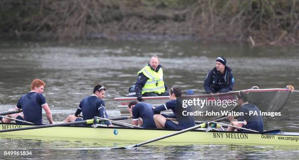 Oxford's Isis Dr Alex Woods puts his head in his hands after his crew win their race one year on from his collapse at the end of last year's boat...