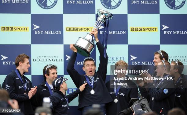 The Oxford University Eight celebrate winning the 159th Boat Race on the River Thames, London.