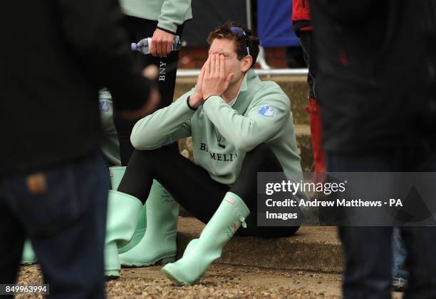 Cambridge University's Alexander Scharp looks dejected after the 159th Boat Race on the River Thames, London.