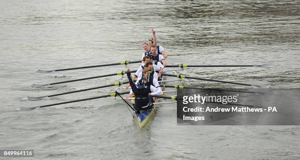 The Oxford University Eight celebrate winning the 159th Boat Race on the River Thames, London.