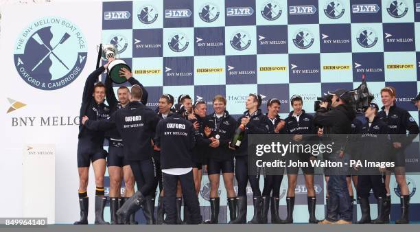 Oxford's president Alex Davidson celebrates with Karl Hudspith who celebrates his birthday as well as celebrates winning the 159th Boat Race on the...