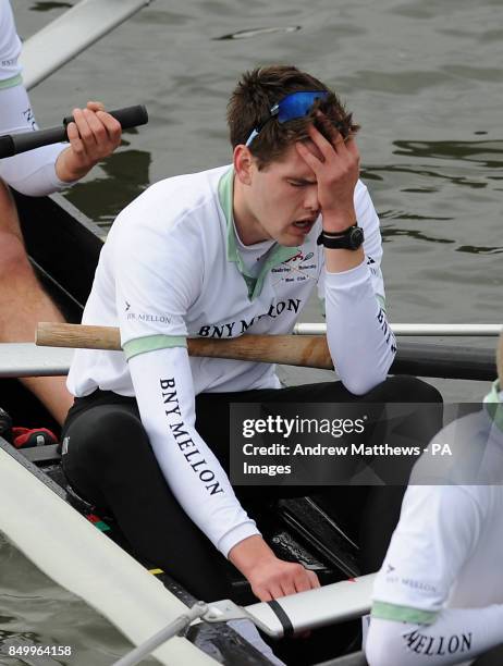 Cambridge University's Alexander Scharp looks dejected after the 159th Boat Race on the River Thames, London.