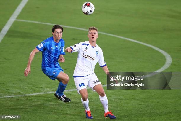 Eoghan Murphy of Gold Coast City and Jesse Daley of South Melbourne compete for the ball during the FFA Cup Quarter Final match between Gold Coast...