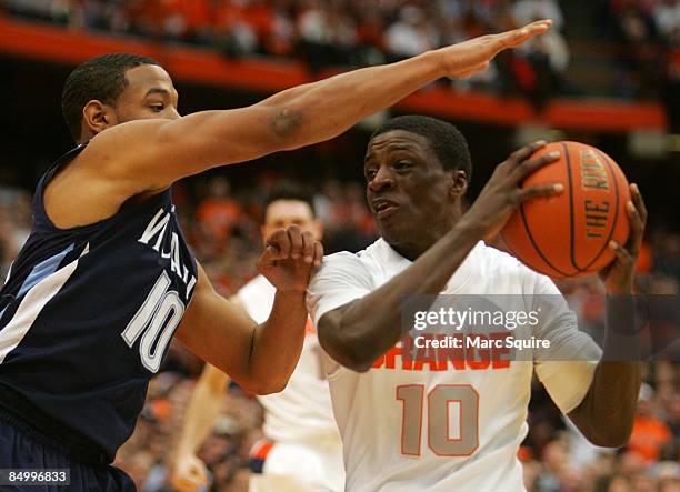 Corey Fisher of the Villanova Wildcats guards Jonny Flynn of the Syracuse Orange during the game on February 22, 2009 at the Carrier Dome in...