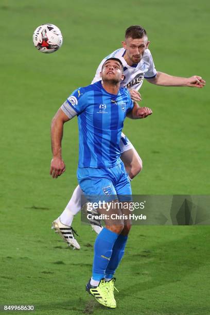 Jarrod Kyle of Gold Coast City and Luke Adams of South Melbourne compete for the ball during the FFA Cup Quarter Final match between Gold Coast City...