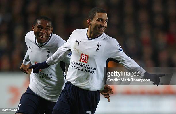 Aaron Lennon of Tottenham Hotspur celebrates scoring the opening goal with team mate Wilson Palacios during the Barclays Premier League match between...