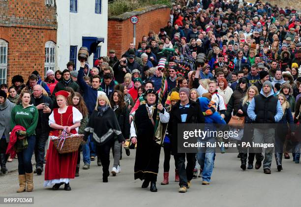 Hare pie parade before the traditional game of bottle kicking at Hallaton, Leicestershire.