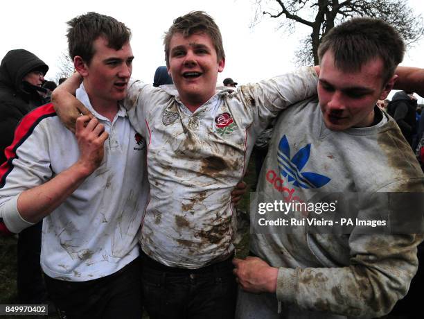 Villagers participate in the traditional game of bottle kicking at Hallaton, Leicestershire.