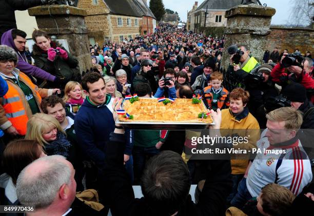 Hare pie before being cut up and thrown into the public before the traditional game of bottle kicking at Hallaton, Leicestershire.