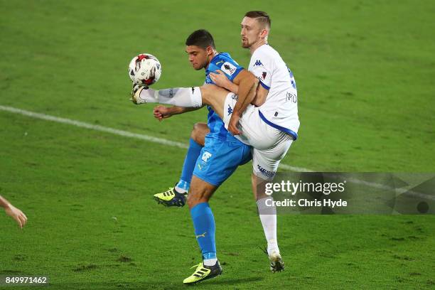 Jarrod Kyle of Gold Coast City and Luke Adams of South Melbourne compete for the ball during the FFA Cup Quarter Final match between Gold Coast City...