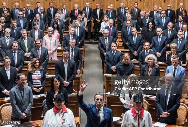 Newly elected Federal Councillor, Liberal-Radical party member Ignazio Cassis , takes oath after the announcement of the vote's results during an...