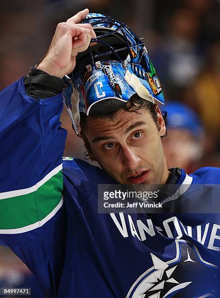 Roberto Luongo of the Vancouver Canucks looks on from his crease during their game against the Carolina Hurricanes at General Motors Place on...