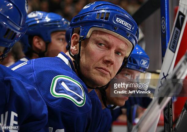 Mats Sundin of the Vancouver Canucks looks on from the bench during their game against the Carolina Hurricanes at General Motors Place on February 3,...