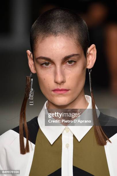 Model, jewelry details, walks the runway at the Atsushi Nakashima show during Milan Fashion Week Spring/Summer 2018 on September 20, 2017 in Milan,...