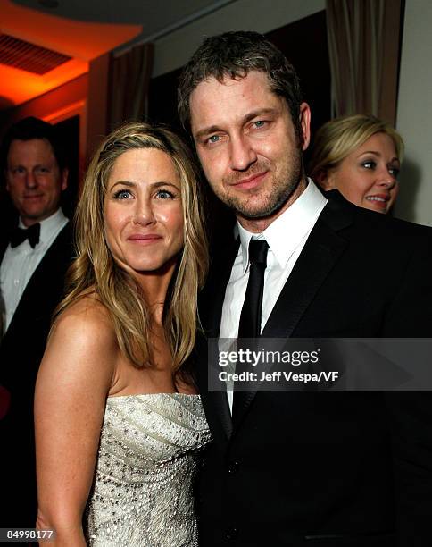 Actors Jennifer Aniston and Gerard Butler attend the 2009 Vanity Fair Oscar party hosted by Graydon Carter at the Sunset Tower Hotel on February 22,...