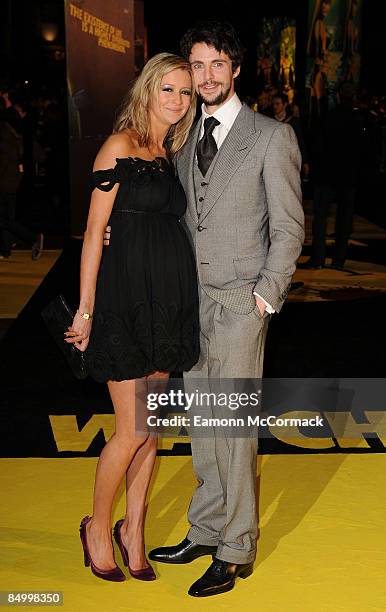 Matthew Goode and partner attend the world premiere of "Watchmen" at Odeon Leicester Square on February 23, 2009 in London, England.