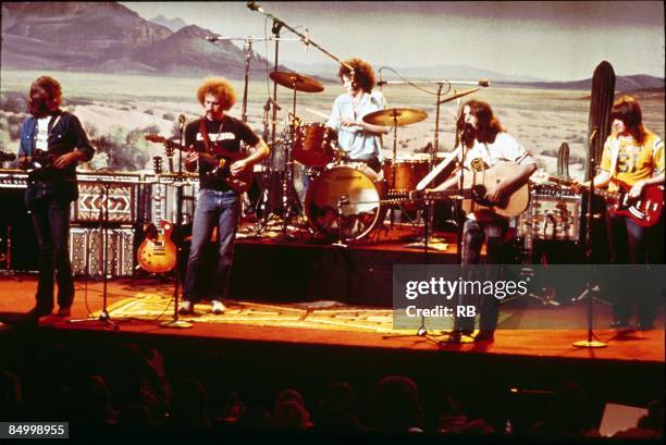 Photo of EAGLES; !IMAGE REVERSED! - L-R: Don Felder, Bernie Leadon, Don Henley, Glenn Frey, Randy Meisner - performing live onstage c.1974/1975