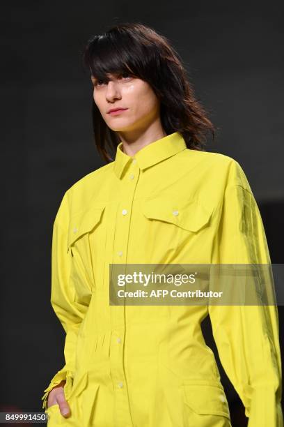 Model presents a creation for fashion house Atsushi Nakashima during the Women's Spring/Summer 2018 fashion shows in Milan, on September 20, 2017. /...