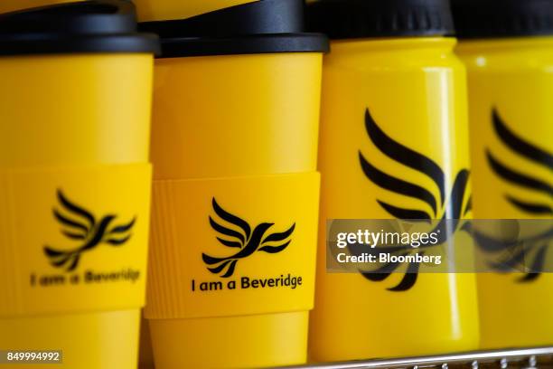 S Liberal Democrat Party branded drink containers sit at the party's annual conference in Bournemouth, U.K., on Tuesday, Sept. 19, 2017. Cable said...