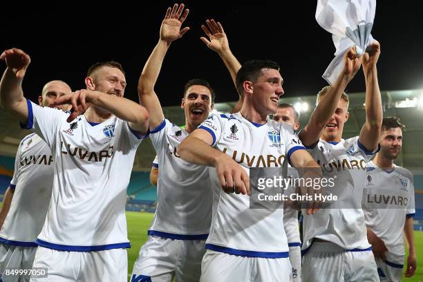 South Melbourne celebrate winning the FFA Cup Quarter Final match between Gold Coast City FC and South Melbourne at Cbus Super Stadium on September...