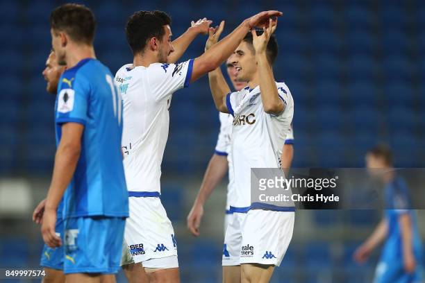 Stefan Zinni of South Melbourne celebrates with team mates after scoring during the FFA Cup Quarter Final match between Gold Coast City FC and South...