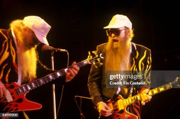 Photo of Billy GIBBONS and Dusty HILL and ZZ TOP, Dusty Hill and Billy Gibbons performing live onstage at Monsters Of Rock